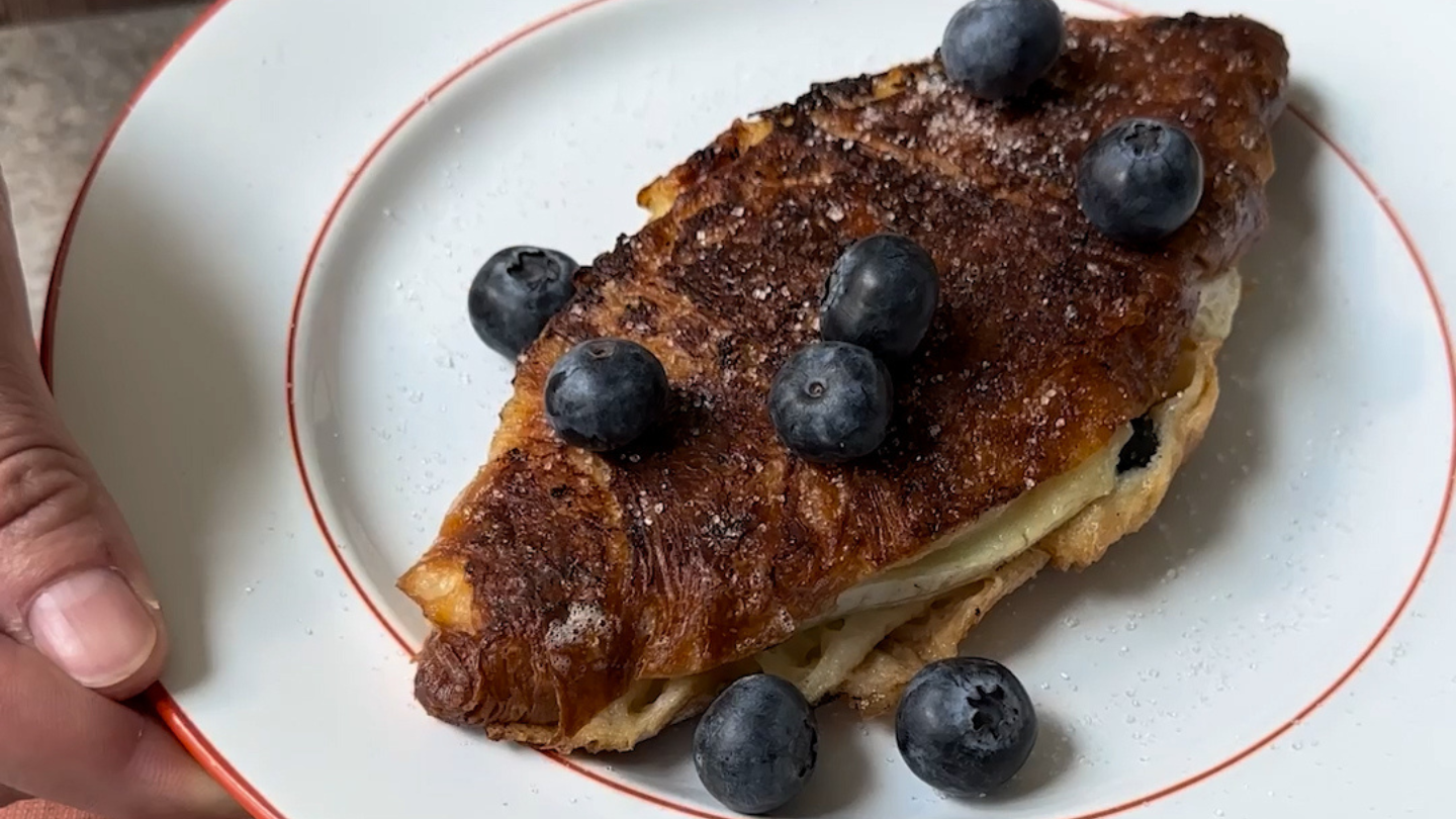 French toast made with croissants, brie and blueberries