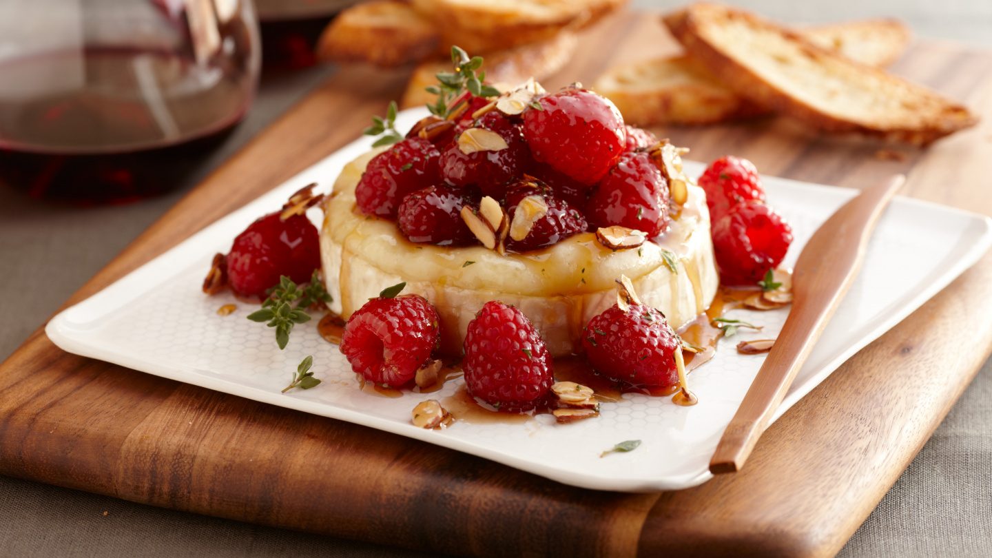 Raspberry Brie with Honey & Almonds, made with Driscolls Raspberries